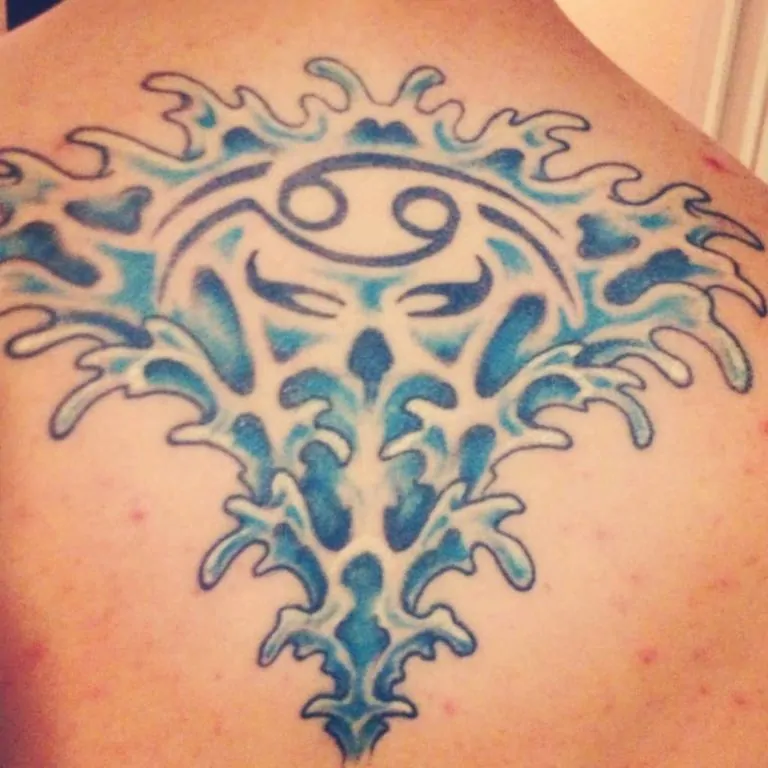 Cancer Sign Water Tattoo On UpperBack