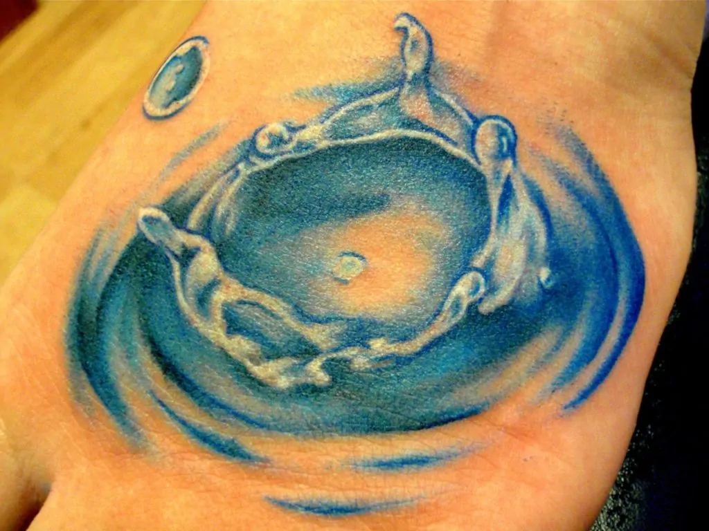Impressive Water Drop Tattoo On Hand