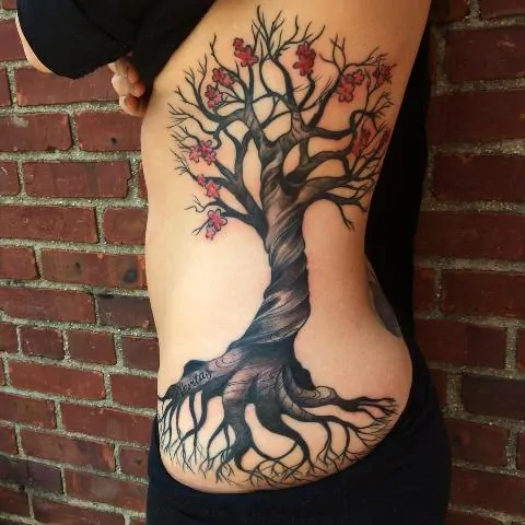 Realistic tree tattoo on the side