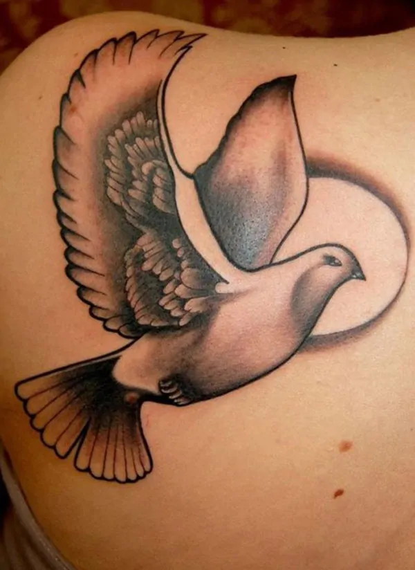 Dove tattoo on back